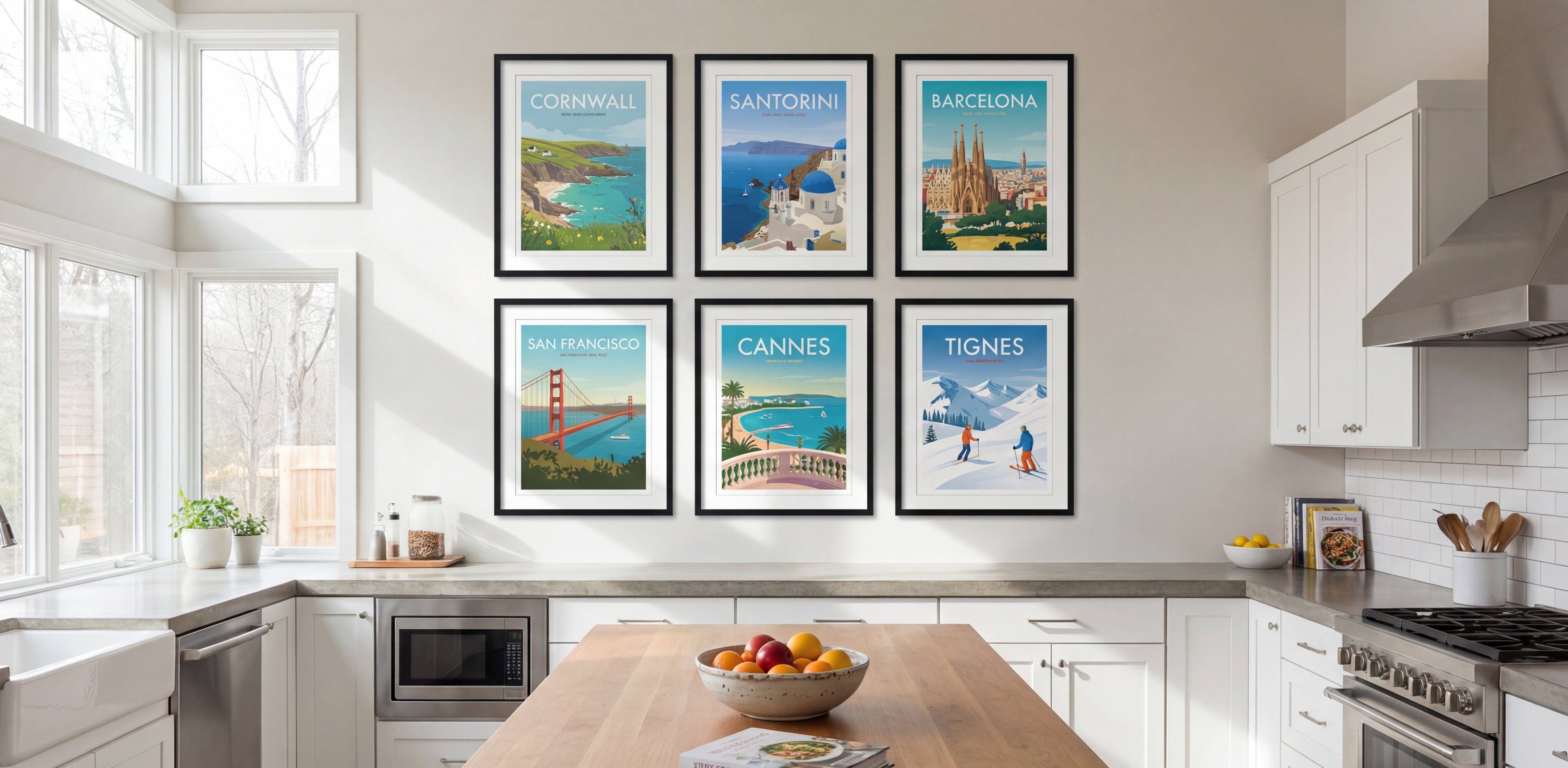 Modern kitchen with travel-themed wall art above a wooden island.